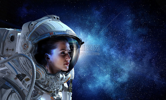 太空任务中的宇航员女,背景星空宇航员先驱做研究图片