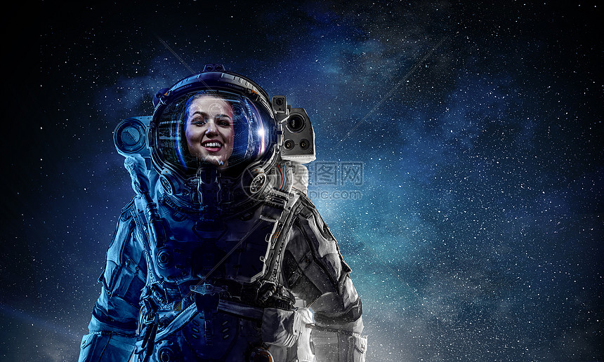 太空任务中的宇航员女,背景星空宇航员先驱做研究高清图片下载-正版