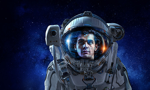 宇航员头盔戴太空头盔的宇航员的肖像梦想太空背景