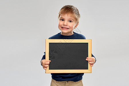 童,教育,学校,广告人的小男孩着黑色空笔板小男孩着黑色的空笔板图片