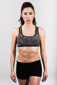 轻运动感健身女身体摆白色背景上图片