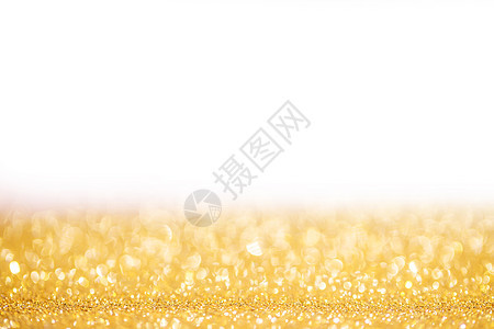 金色闪光的诞背景金色闪光的诞抽象背景与白色的图片