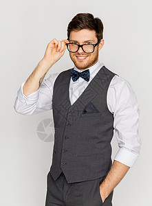时尚,风格复古的快乐的穿着节日西装眼镜穿着节日西装眼镜的快乐男人图片