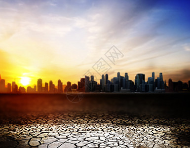 生态环境气候变化城市日落时沙漠表开裂城市日落时沙漠表裂开背景图片