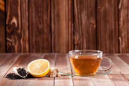 红糖粑粑红茶与柠檬红糖立方体木桌上,放置文字各种类型的茶背景