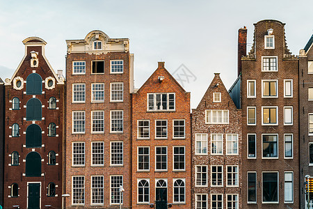集成房屋秋天阿姆斯特丹运河上荷兰房屋的美丽建筑背景