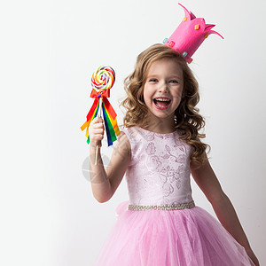 美丽的糖果公主女孩皇冠上着大棒棒糖微笑糖果公主女孩棒棒糖图片