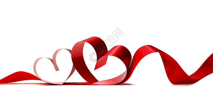 爱要说出来红色丝带分离出来的心白色的背景上背景