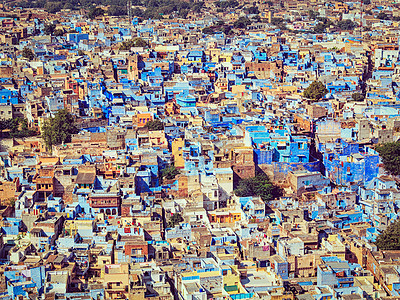复古效果过滤了乔德普尔的时髦风格形象,也被称为蓝色城市,因为生动的蓝色布雷明房子周围的梅兰加赫堡乔杜尔,拉贾斯坦邦印度拉图片