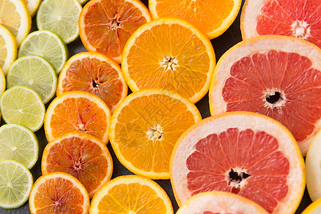 食物健康的饮食接近柚子,橘子,柠檬石灰片同的柑橘类水果片图片