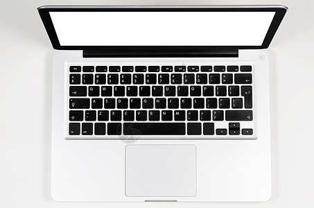现代笔记本电脑,俯视图现代笔记本电脑,白色桌子上空白屏幕,看图片