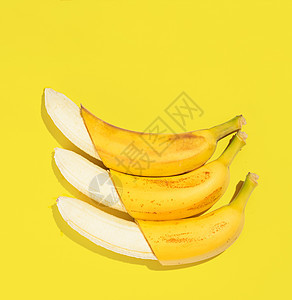 扁平香蕉背景新鲜香蕉黄色背景,看图片