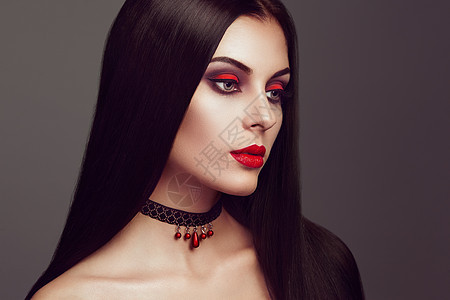 万节吸血鬼女人肖像美丽的魅力,时尚,感的吸血鬼女士,长发,美丽的化妆服装图片