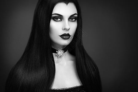 万节吸血鬼女人肖像美丽的魅力,时尚,感的吸血鬼女士,长发图片