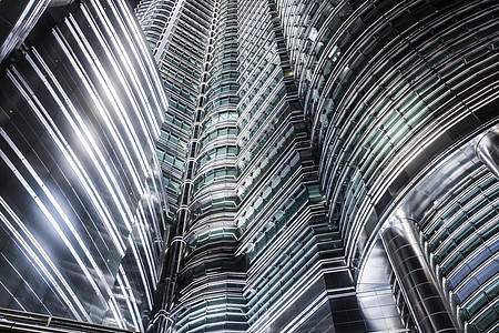 彼得龙纳斯塔的摩天大楼背景马来西亚吉隆坡Petronas双塔摩天大楼抽象背景背景图片