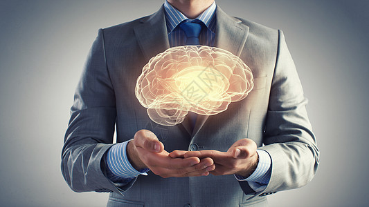 人类的头脑商人持数字图像的大脑手掌图片