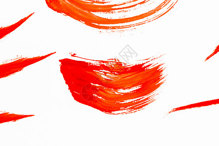 油漆涂片白色背景上橙色油漆的抽象涂片图片