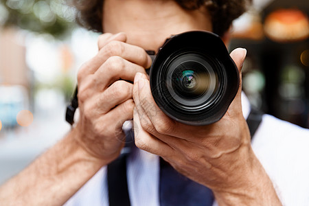 摄影师男男摄影师拍照专业摄影师城市拍照背景