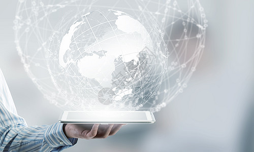 连接世界的技术商人手持平板电脑与全球连接背景图片