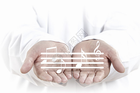 抒情音乐用音乐音符数字特写人类的手背景