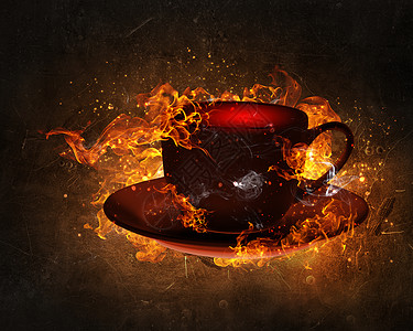 热咖啡饮料杯咖啡黑暗背景下的火焰中图片