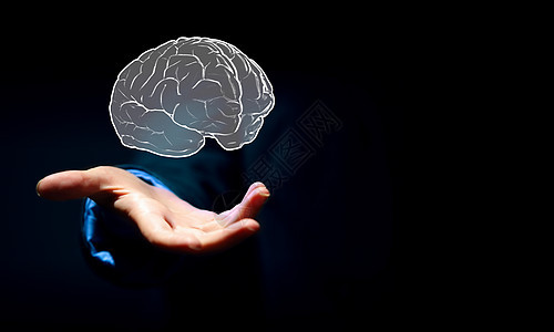 人类的大脑靠近商人的手,把大脑握掌心图片