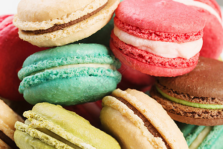 糖果饼干套美味的马卡龙排排五颜六色的美味马卡龙背景