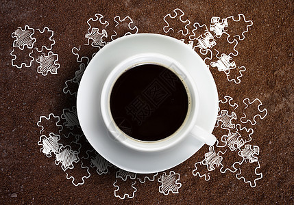 咖啡休息时间桌子上杯咖啡,背景上草图图片