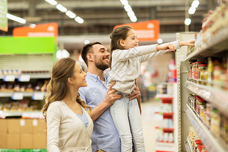 销售,购物,消费主义人们的幸福的家庭与孩子购买食品杂货店超市图片