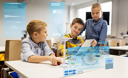 教育,科学,技术,儿童人的群微笑的孩子学生与平板电脑电脑编程电动风车玩具机器人学校课程机器人学校平板电脑编图片