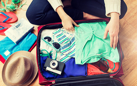 暑假,旅游,旅游物品妇女包装旅行袋度假妇女包装旅行袋度假图片