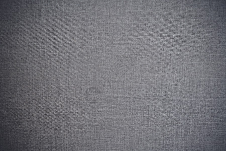 灰色背景布纺背景灰色羊毛物中经典的纤维纹理背景