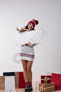 诞女人着大白卡电脑冬季针豆帽全长图片