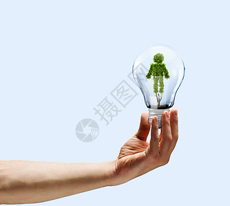 生态人的手着灯泡,植物形状像人图片