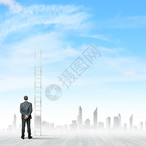 梯子顶商人站通往天空的长梯子附近的背景图片