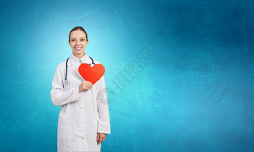 专业照顾你的心吸引力的保健女工,红色的心脏象征图片