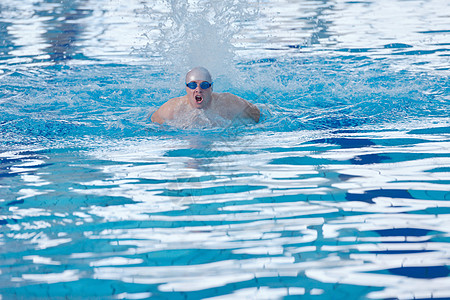游泳男健康健身生活方式的与轻运动员游泳重新室内奥林匹克游泳池背景