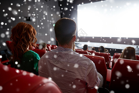 电影,娱乐活动,休闲人的夫妇剧院看电影后雪花图片