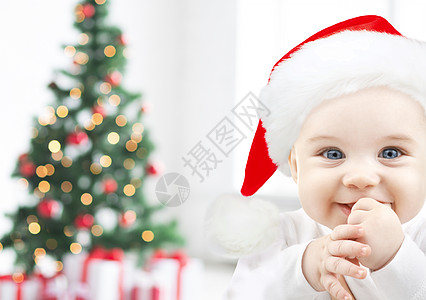 假期,婴儿期,童人的快乐的婴儿诞帽诞树灯礼物背景图片