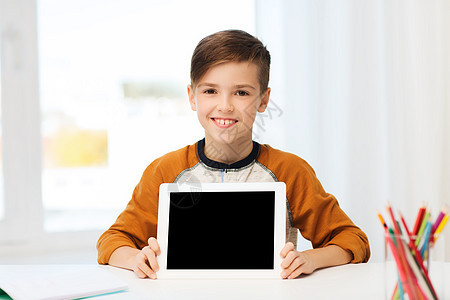 休闲,儿童,技术,教育人的微笑男孩空平板电脑电脑屏幕家里图片
