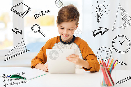 休闲,儿童,教育,技术人的微笑男孩与平板电脑笔记本家里的数学涂鸦图片