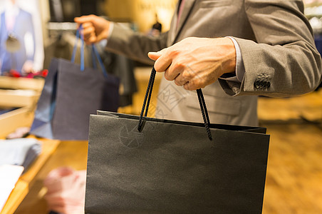 销售,时尚,零售,商业风格人的密切的人穿着购物袋服装店图片
