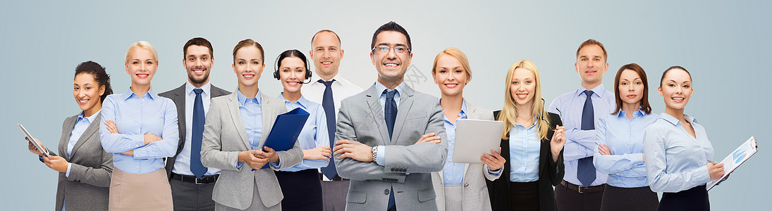 商业,人,公司,队合作办公室群蓝色背景的快乐商人图片