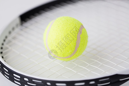 运动,健身,健康的生活方式物体的近距离的网球拍与球背景图片