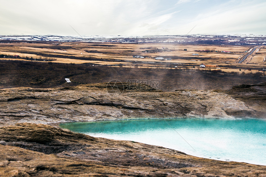 冰岛的间歇泉,蒸汽的蓝色水图片