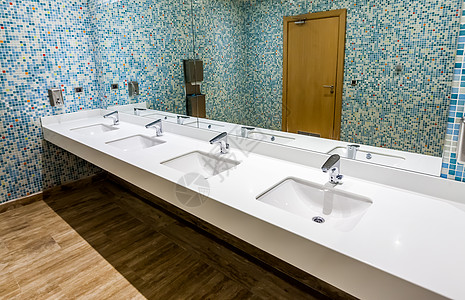 洗水台现代公共WC,蓝色洗脸盆公共洗手间背景