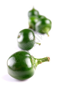 绿色辣椒的特写图片