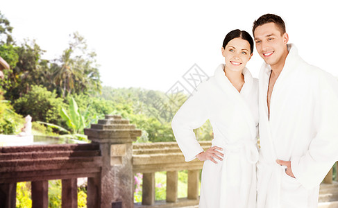 人,旅游,度假蜜月幸福夫妇浴袍温泉酒店度假背景图片