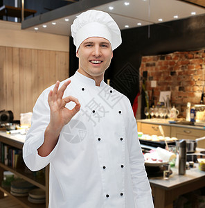 烹饪,职业,手势人的快乐的男厨师厨房背景上OK标志图片