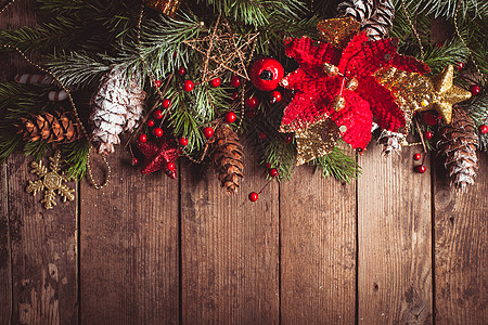 圣诞节雪花木制背景上的圣诞边框背景